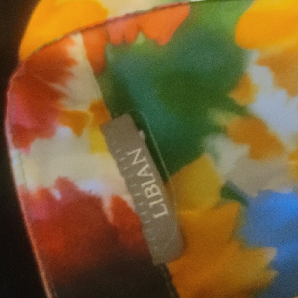 Is a multicolor flower sheer blouse